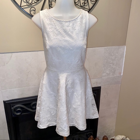 bebe Dresses & Skirts - BeBe Women’s White Sleeveless Skater Dress SZ 0